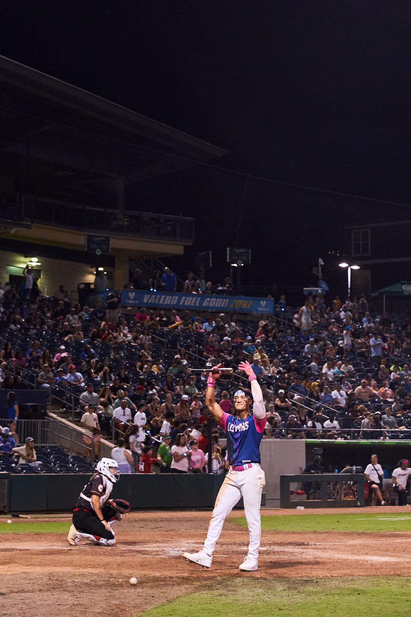 Packed stadium at night during a Boom Ball game